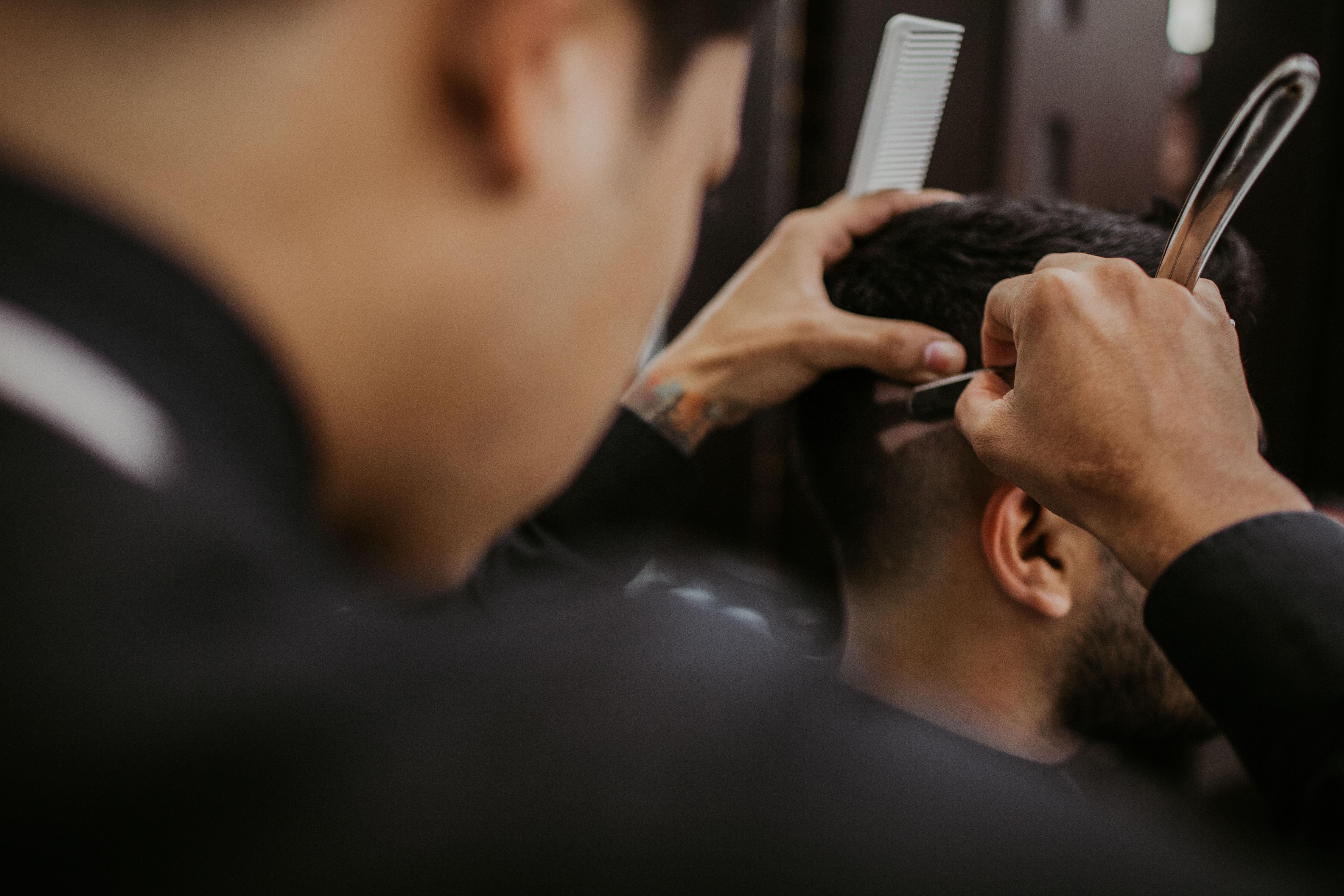 Barber Cutting Hair